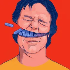 Otwarta szczęka mężczyzny wypełniona tabletkami Xanax, sugerująca skutki uboczne leku.